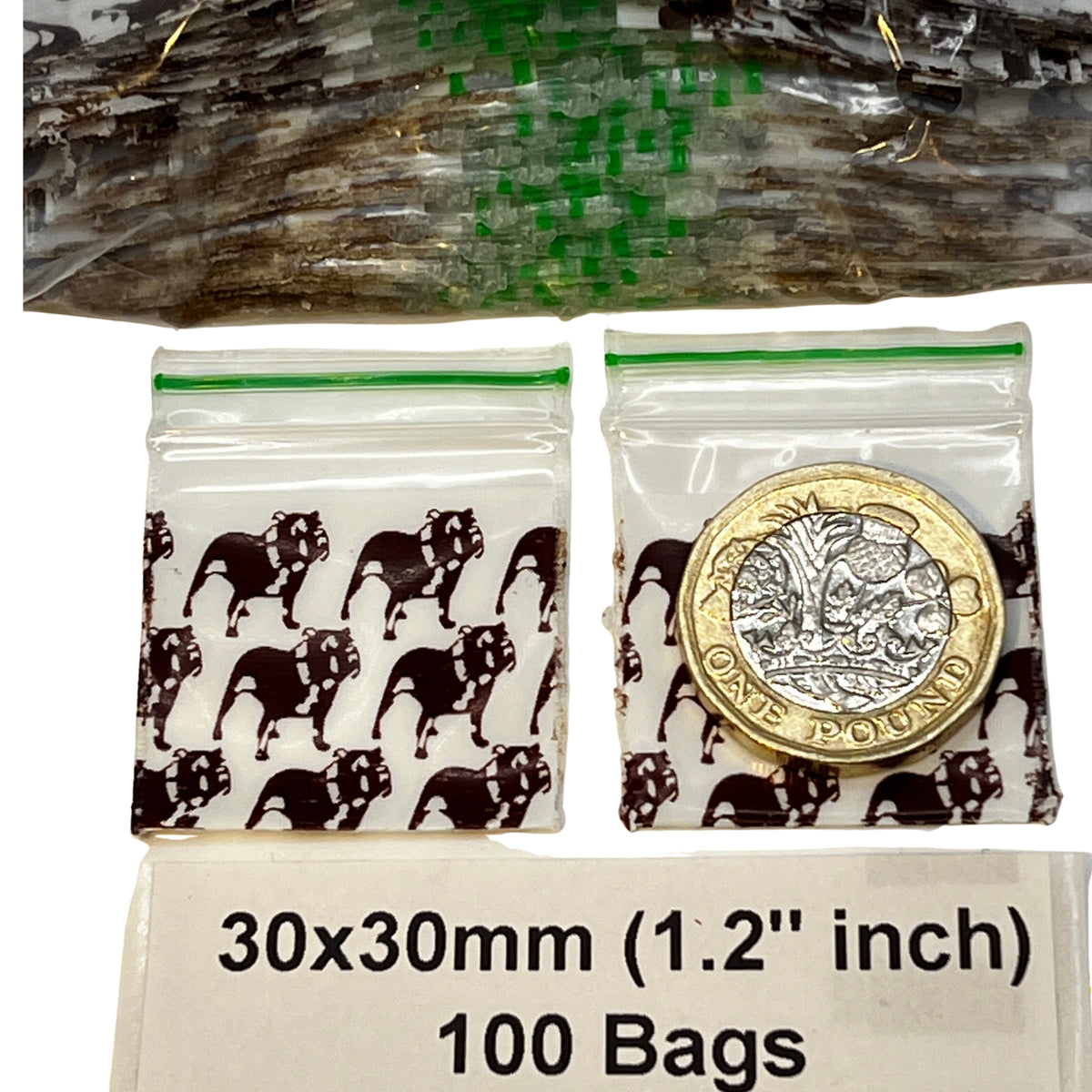 Clear plastic sample bags with top dog print zipper seals, printed with black dog print and shown with a 1-pound coin for scale. 
