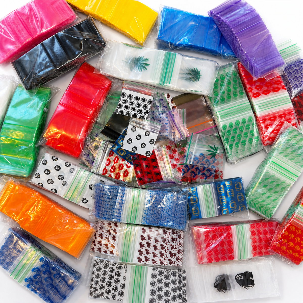 Assorted 40x40mm printed resealable plastic poly zip bags in multiple designs