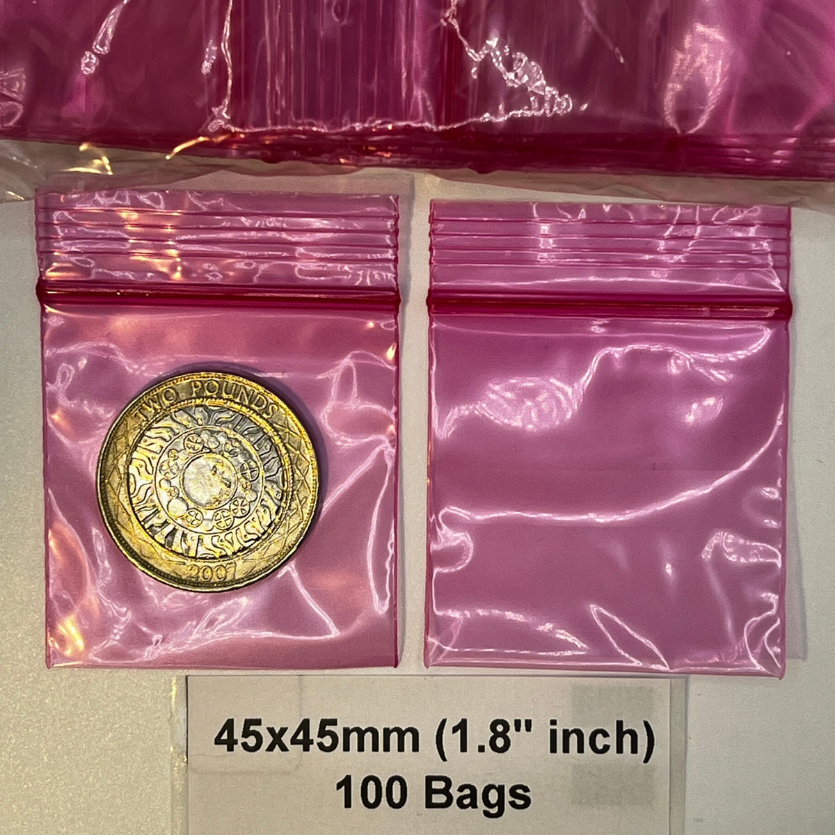 45x45mm 1.8 inch pink poly grip seal bags 100 pack