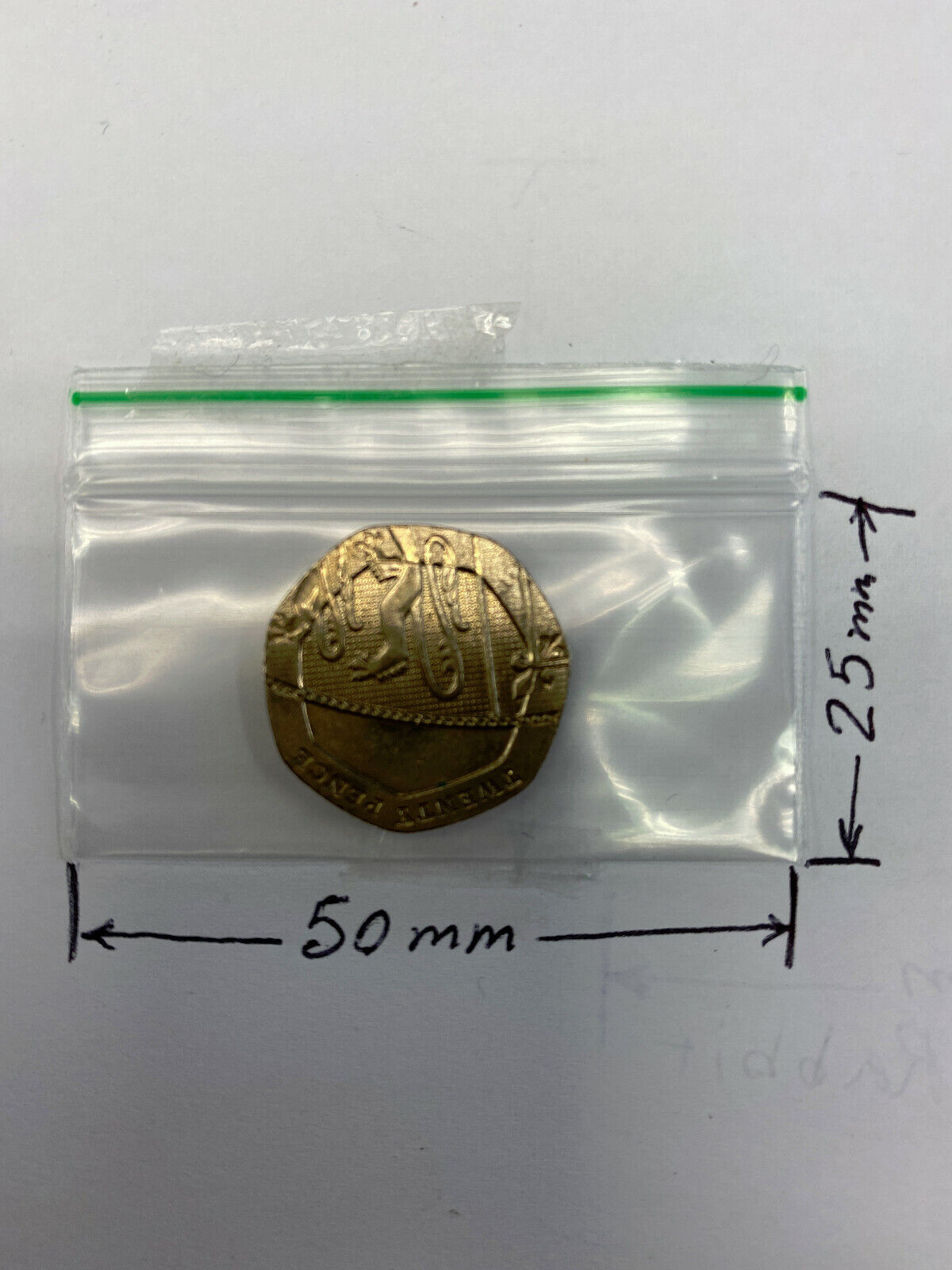 clear plastic zip bag, with dimension markers showing 50 mm width and 25 mm height on a plain light background.