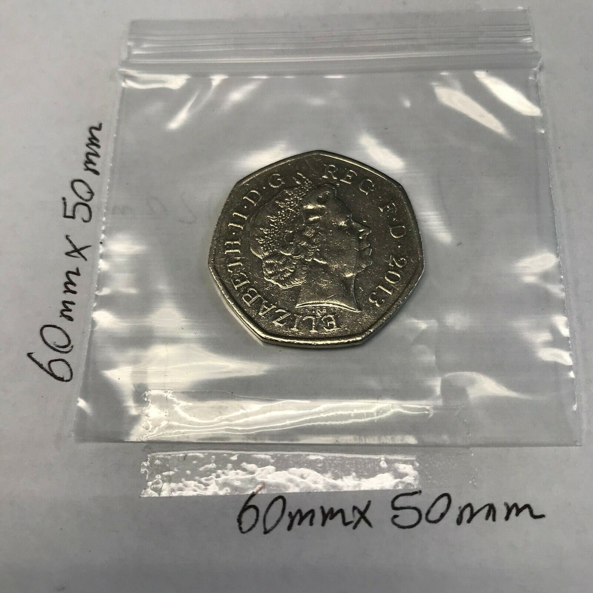  clear plastic zip bag, with  dimensions of 60mm x 50mm on a white background.